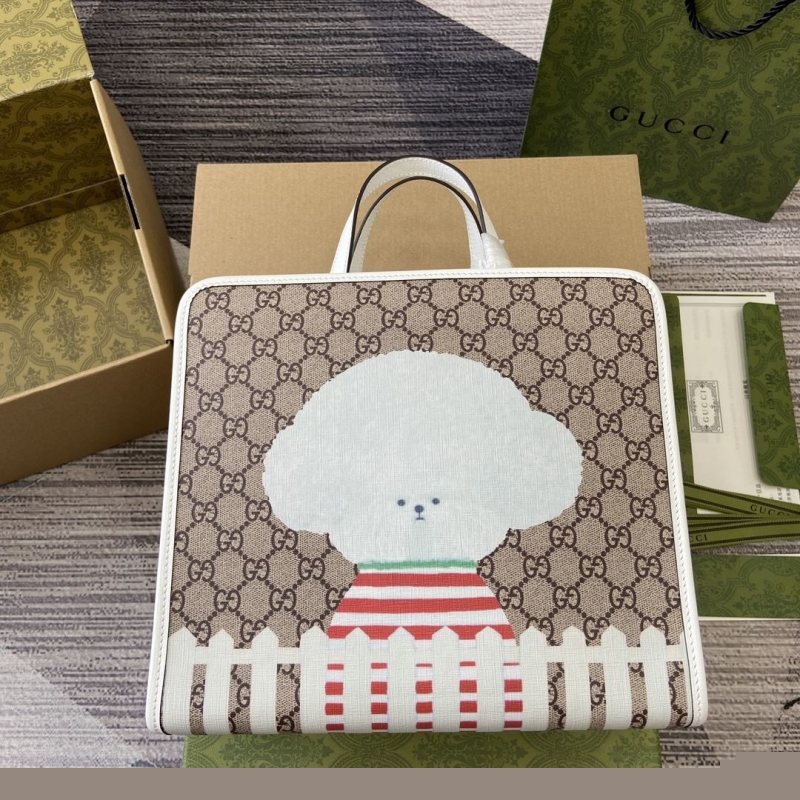 G*u*i shopping bags